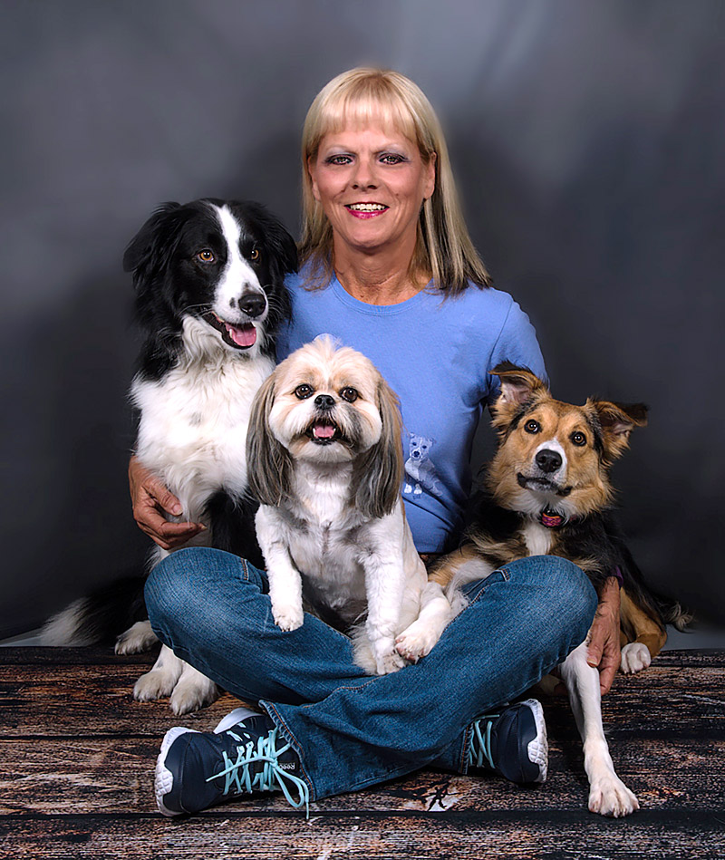 Mary Schelling and three dogs